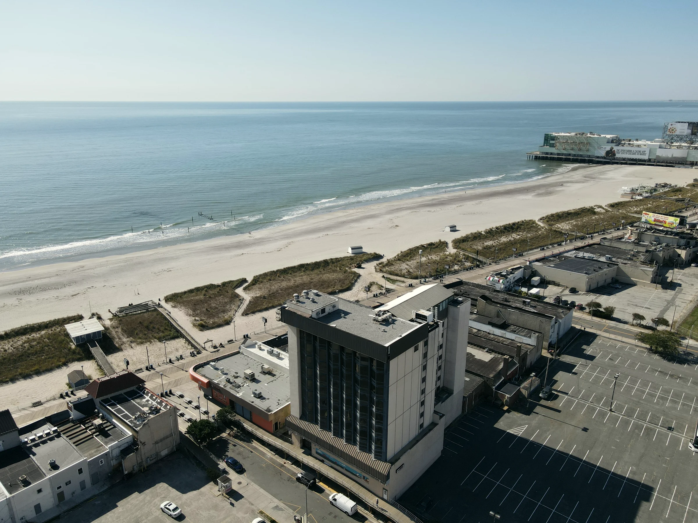 Aerial view of Boardwalk House, the Atlantic City beach, and the Boardwalk